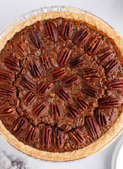 Pecan pie on a marbled countertop.