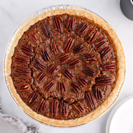 Pecan pie on a marbled countertop.