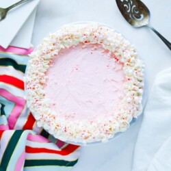 Peppermint Pie with a spatula and colorful cloth napkin.
