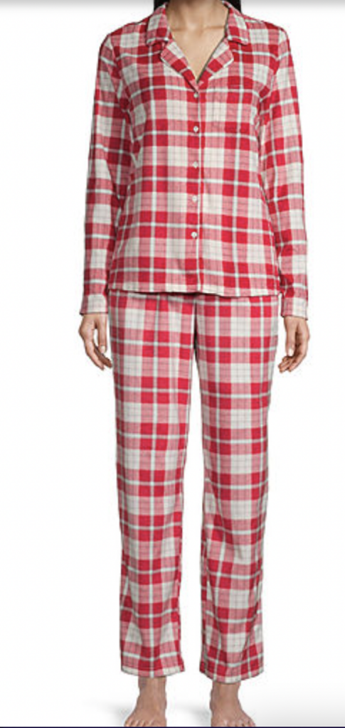 Person in button-up red and white plaid pajamas.
