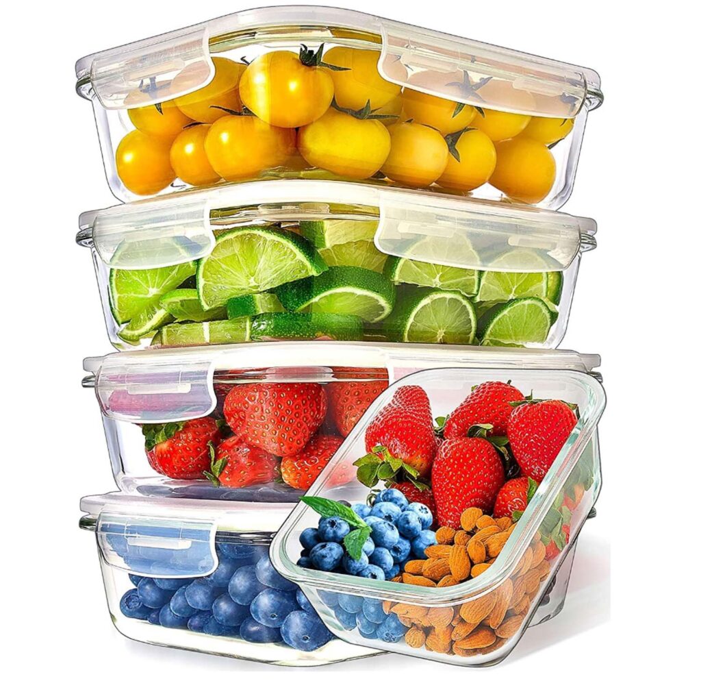 individually stacked glass freezer containers with various fruit inside