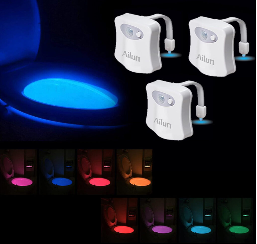 Colorful toilet lights against a black background.