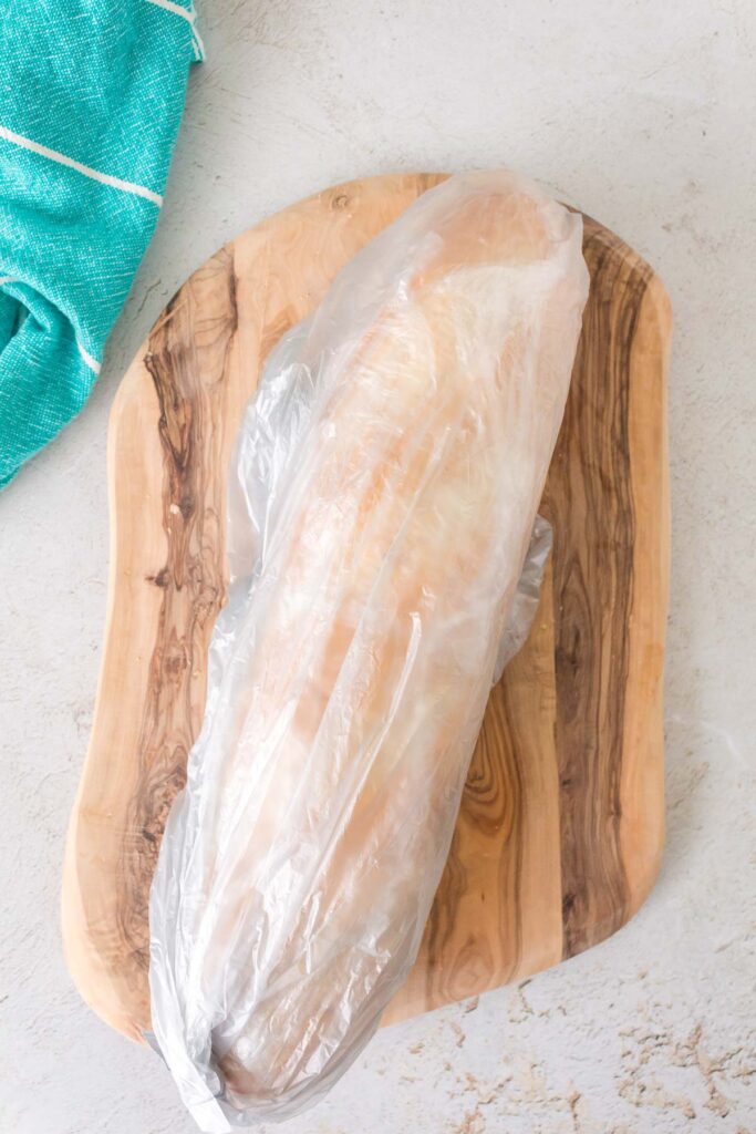 bread wrapped and bagged into a plastic bag.